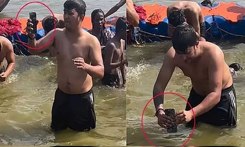 கும்பமேளாவில் தனது மொபைலை நீரில் முக்கி புனித நீராட்டிய விசித்திர மனிதர்