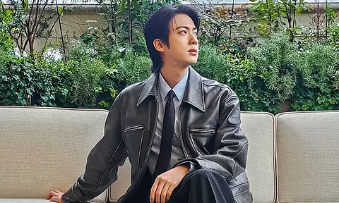 Fan kisses BTS singer Jin...a bold move!