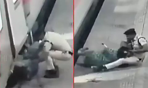 ஓடும் ரெயிலில் இருந்து விழுந்த பெண்: நொடிப்பொழுதில் காவலர் செய்த செயல் - வைரல் வீடியோ