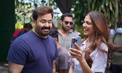 'Hridayapoorvam' first schedule of shooting completed - Malavika Mohanan saree photos