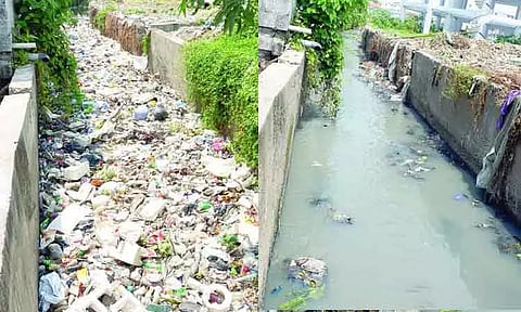 கழிவுநீர் கால்வாயில் தேங்கிய குப்பைகள் அகற்றம்