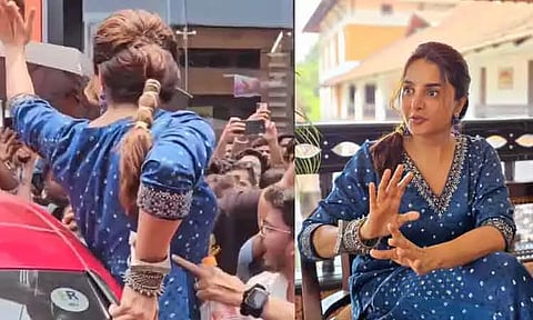 நடிகை மஞ்சு வாரியரின் இடுப்பை தொட்ட இளைஞரால் பரபரப்பு