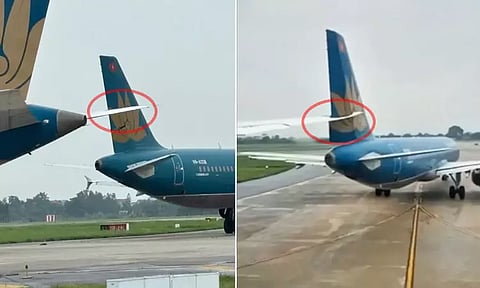 வியட்நாமில் விமானங்களின் இறக்கை உரசியதால் 4 விமானிகள் பணியிடை நீக்கம்