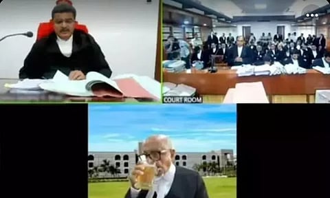 ஆன்லைன் வழக்கு விசாரணையில் பீர் குடித்த வழக்கறிஞர்; குஜராத் ஐகோர்ட்டு அதிரடி உத்தரவு