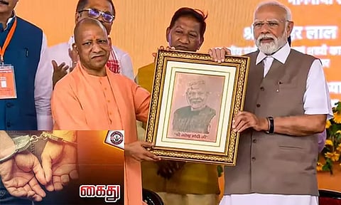 பிரதமர் மோடி, உ.பி. முதல்-மந்திரி குறித்து சர்ச்சை கருத்து; இளைஞர் கைது