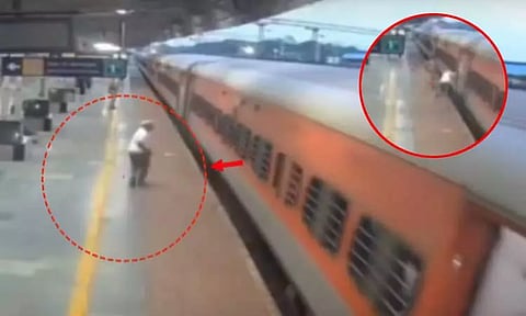 ஓடும் ரெயிலில் ஏற முயன்று தவறி விழுந்த முதியவர் - துரிதமாக செயல்பட்ட காவலர்