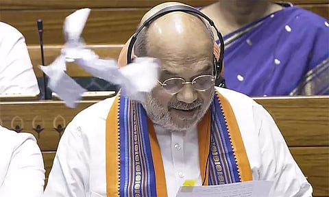 பிரதமர், முதல்-மந்திரிகளை பதவி நீக்கம் செய்யும் மசோதா தாக்கல்; மசோதாக்களை கிழித்தெறிந்து எதிர்க்கட்சிகள் அமளி