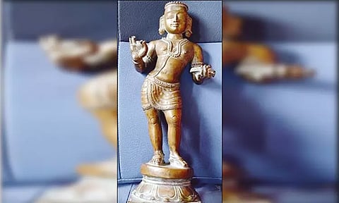 உசிலம்பட்டி அம்மன் கோவிலில் இருந்து திருடப்பட்ட மாணிக்கவாசகர் சிலை மீட்பு - இருவர் கைது