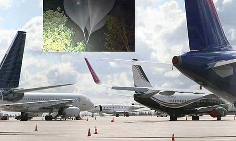 விமான நிலையம் அருகே பறந்த மர்ம பலூன்கள்; விமான சேவை நிறுத்தம்