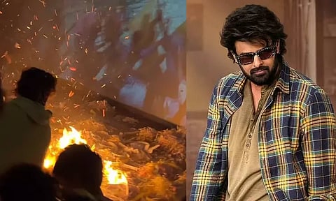 பிரபாஸ் படத்திற்கு ஆரத்தி எடுத்த ரசிகர்கள்; திரையரங்கில் தீ பிடித்ததால் பரபரப்பு