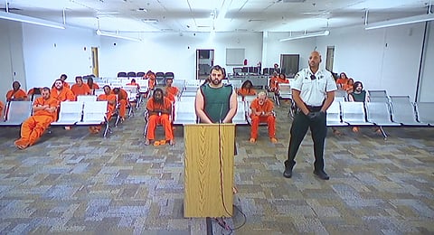 Hisham Abugharbieh, facing two counts of first-degree murder appears in court via video on Saturday, April 25, 2026 in Tampa, Fla.