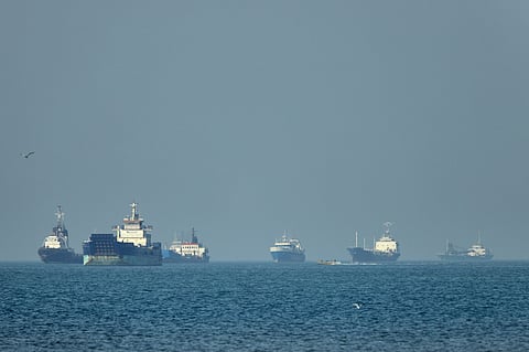A tanker, left, and a car carrier are anchored at sea in the Gulf of Oman near the Strait of Hormuz, as seen from the coast near Khor Fakkan, United Arab Emirates, Friday, May 1, 2026. AP Photo