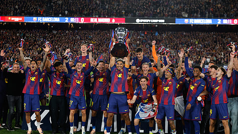 Barcelona retains Spanish league title by beating rival Real Madrid
