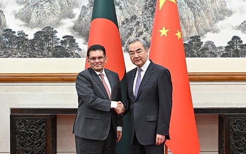 Chinese Foreign Minister Wang Yi, also a member of China, holds talks with Bangladeshi Foreign Minister Khalilur Rahman in Beijing, capital of China, May 6, 2026. Photo: Xinhua