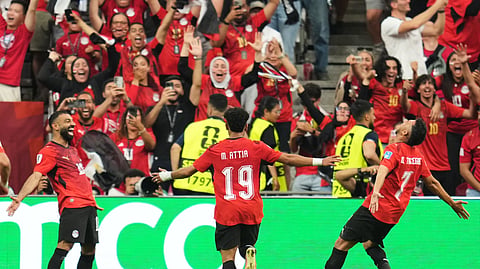 Egypt's Trezeguet (7) celebrates with Mohamed Salah (10) and Marawan Attia (19) after scoring his side's third goal during the World Cup Group G match between New Zealand and Egypt in Vancouver, Canada on Monday.