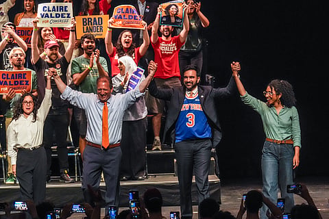 Democratic congressional candidates, Claire Valdez, Brad Lander, and Darializa Avila Chevalier gesture on stage with Mayor Zohran Mamdani during a Get Out The Vote rally ahead of New York's primary election, Thursday, 18 June 2026, in the Brooklyn borough of New York. 