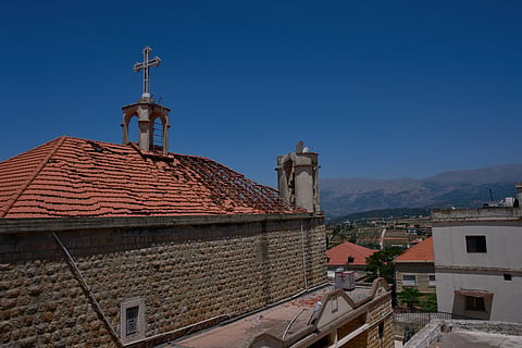 The damaged roof and bell tower of St George Greek Orthodox Church are seen in the southern town of Jdeitat Marjayoun, Lebanon, Wednesday, 10 June 2026. 