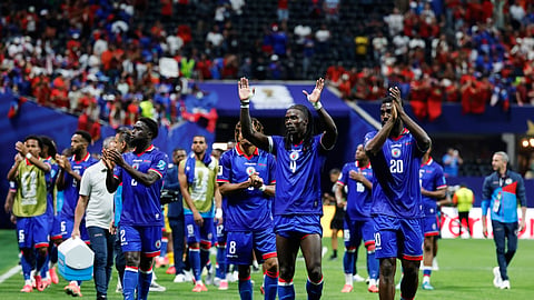 Haiti players acknowledge cheers from fans after the team's World Cup Group C match between Morocco and Haiti in Atlanta on Thursday.