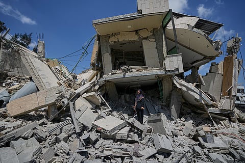 Hanan Qubaisi inspects her house destroyed in previous Israeli airstrikes in the town of Nabatiyeh, southern Lebanon, 24 June 2026, after a ceasefire between Israel and Hezbollah.