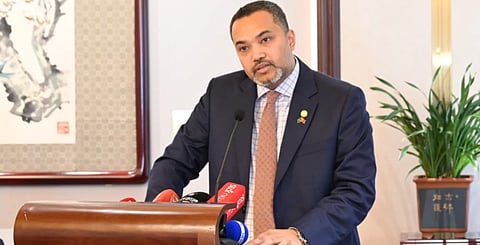 PMO Spokesperson Mahdi Amin briefs reporters at a press conference at the Diaoyutai Hotel in Beijing on June 26, 2026. 