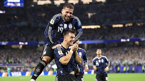 Argentina's Giovani Lo Celso celebrates with Nicolas Otamendi after opening the scoring for his side against Jordan in their Group J match of the FIFA World Cup 2026 in Dallas on Sunday.