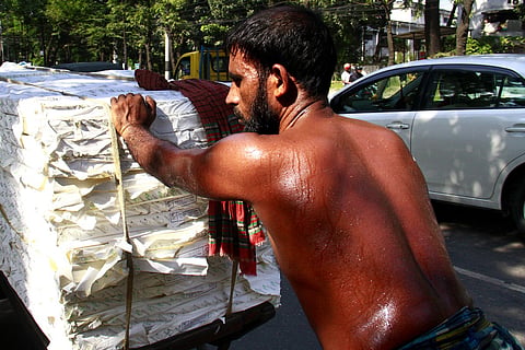 For workers in Dhaka, escaping the heat is nearly impossible