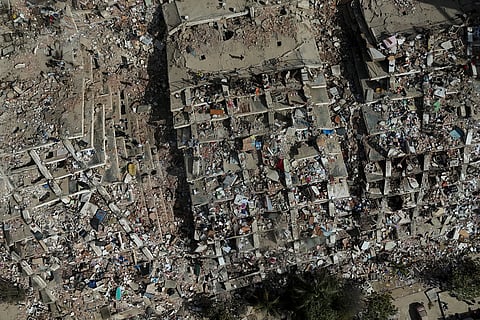 Damaged buildings are seen three days after earthquakes struck in La Guaira, Venezuela,