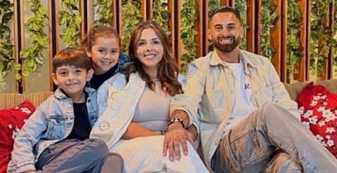 Argentine defender Lucas Trejo's wife, Yanina Maranella, and their children, Aaron and Ainhoa Trejo