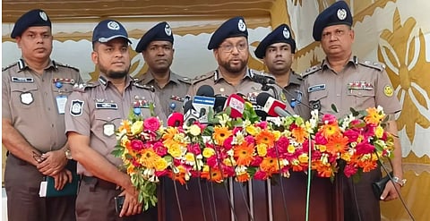 DMP Commissioner Musleh Uddin Ahmed speaks to reporters after inaugurating an AI-powered traffic camera at Lake Road under the Tejgaon Traffic Division in Dhaka on Tuesday.