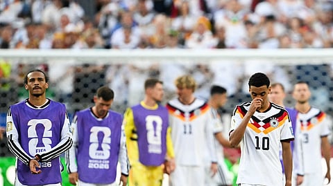 Germany players leave the field dejected after their defeat against Paraguay in the Round of 32 clash on Tuesday.