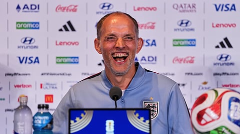 England head coach Thomas Tuchel laughs to the media during a press conference ahead of the World Cup Group L match between England and Ghana in Foxborough on Monday