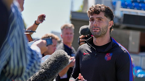 United States' Christian Pulisic speaks with the media before a training session ahead of their World Cup Round of 32 match against Bosnia and Herzegovina, on Tuesday