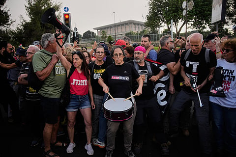 People protest outside the Knesset, Israel's parliament, in Jerusalem, marking 1,000 days since the 7 Oct 2023, Hamas-led attack on Israel, 2 July 2026.