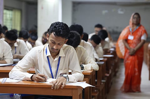 Students sit for the 2026 HSC examinations at Habibullah Bahar University College in Shantinagar, Dhaka, on Thursday, as teachers and invigilators monitor the examination hall.
