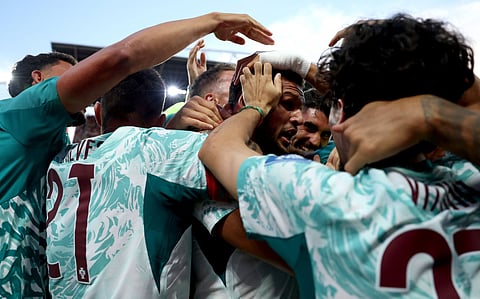 Goncalo Ramos celebrates with Portugal teammates after scoring the winning goal against Croatia in the Round of 32 match in Toronto on Friday.