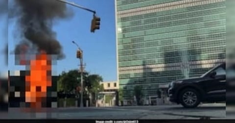 A 52-year-old man sets himself on fire outside the United Nations headquarters in New York on Thursday while carrying a Tibetan flag