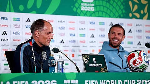 England coach Thomas Tuchel (L) in the pre-match press conference.