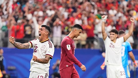Spain's Pedro Porro (12), Pau Cubarsi (22) and Portugal's Cristiano Ronaldo react after Spain defeated Portugal in the World Cup Round of 16 match in Arlington, Texas on Tuesday