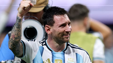 Argentina's Lionel Messi celebrates after the match as Argentina qualify for the quarterfinals of the World Cup
