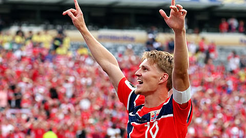 Norway's Martin Odegaard celebrates after the match