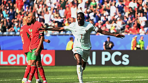 France's Ousmane Dembele celebrates scoring their second goal