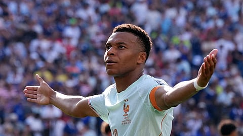 France's Kylian Mbappe celebrates scoring their first goal in their 2-0 win over Morocco in the quarterfinal in Boston on Friday