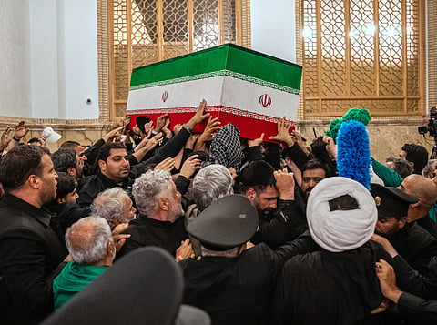 In this photo released by Iran’s Supreme Leader’s office, mourners carry the coffin of the late Iranian Supreme Leader Ayatollah Ali Khamenei above the crowd for the final prayer before his burial at the Imam Reza Shrine in Mashhad, northeastern Iran, Thursday, July 9, 2026. 