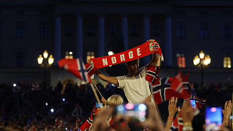 Norway fans gather after their World Cup quarterfinal match against England in front of the Royal Palace in Oslo