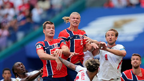 Norway's Erling Haaland and Alexander Sorloth in action with England's Harry Kane, Eberechi Eze and Nico O'Reilly during their World Cup 2026 quarterfinal match