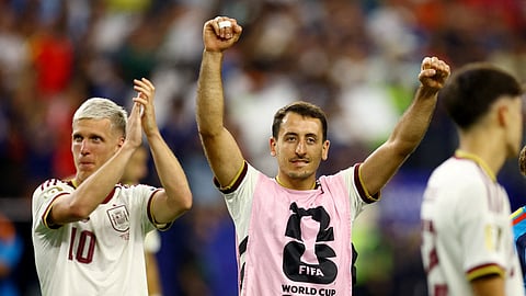 Spain's Mikel Oyarzabal and Dani Olmo celebrate after the match as Spain qualify for the World Cup final