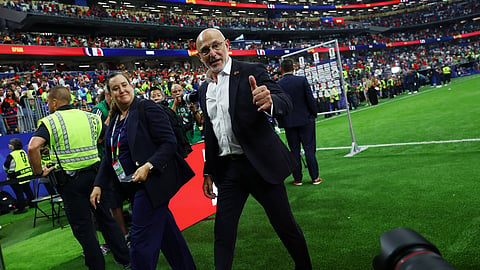 Spain coach Luis De La Fuente celebrates after the match as they advance to the World Cup final