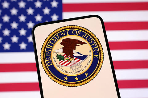United States Department of Justice logo and U.S. flag are seen in this illustration taken on April 23, 2025. REUTERS/Dado Ruvic