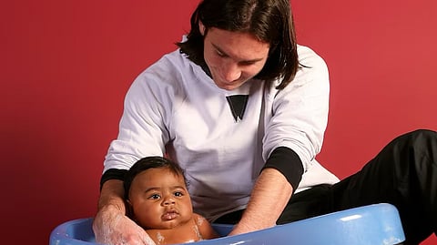 Lionel Messi with Lamine Yamal