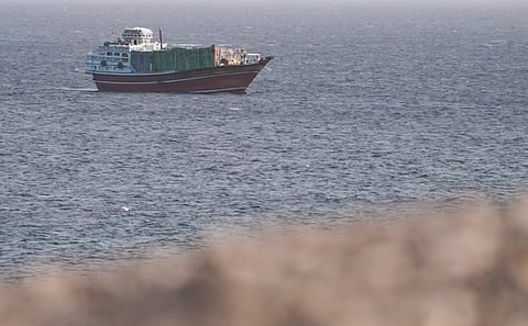 A vessel in the Strait of Hormuz, as seen from Musandam,Oman, 16 July 2026.